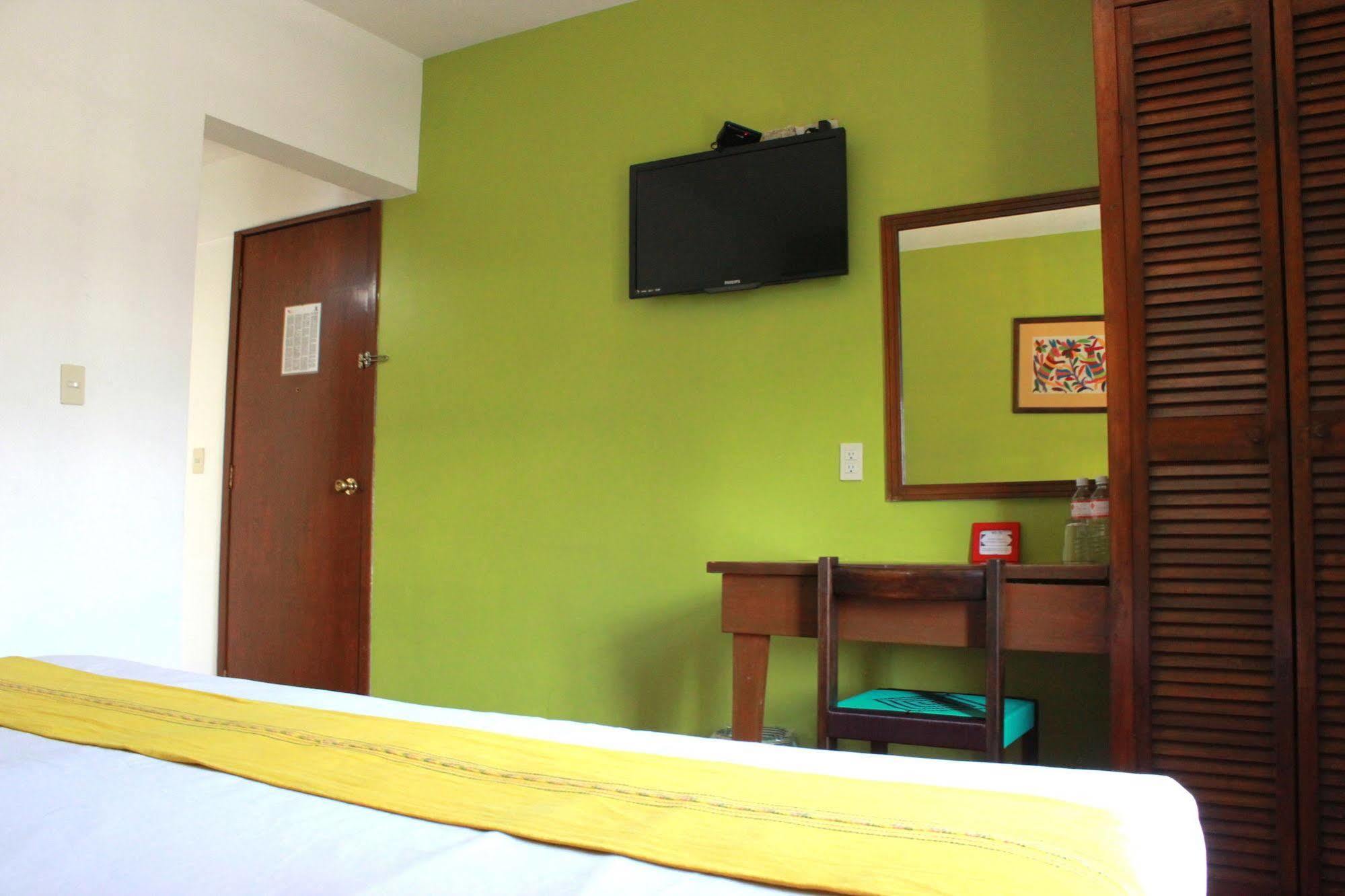 Capital O Crespo Hotel,